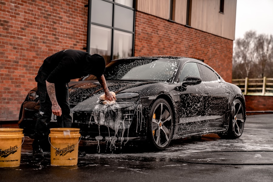 Hand washing a car exterior