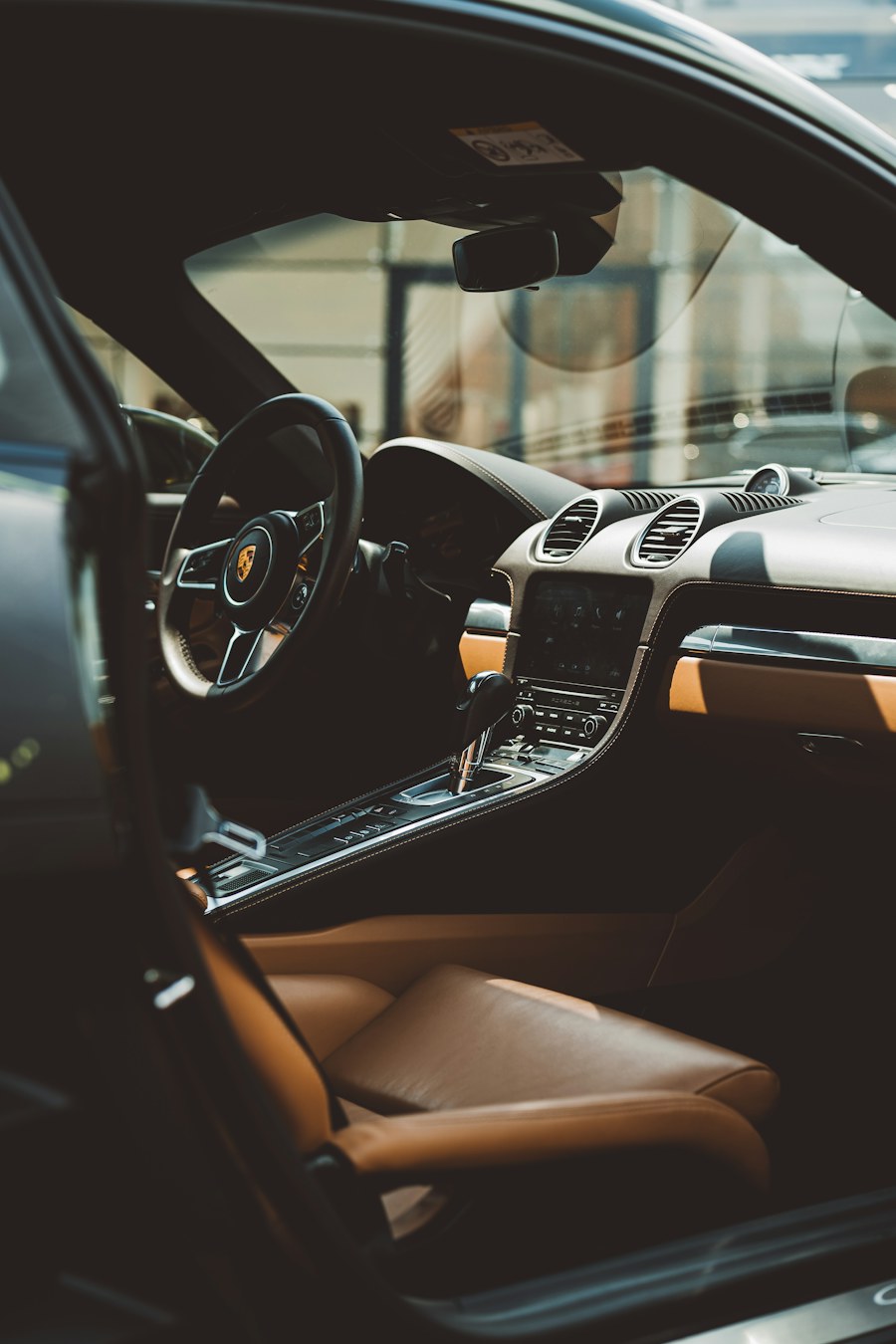 Tan leather seats and a clean car cabin